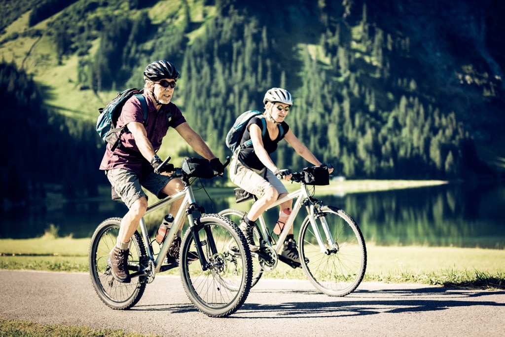Cycling,Seniors,By,The,Lake